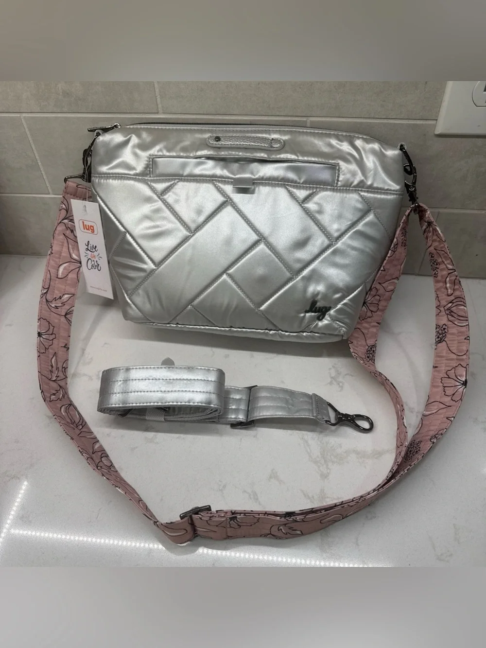 NWT lug Flare Metallic Silver Quilted Crossbody with Pink Floral & silver straps